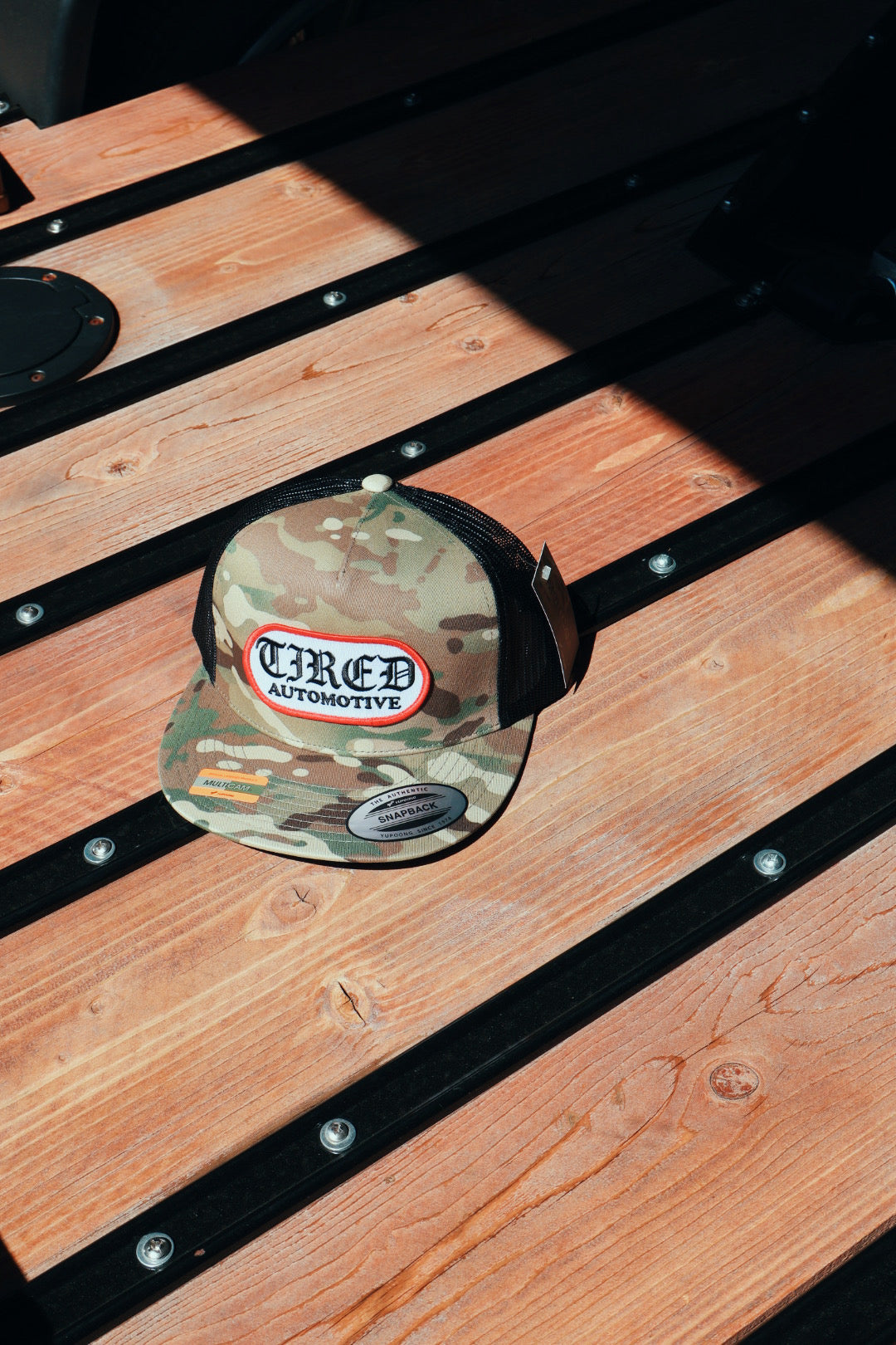 Tired Automotive Old English Logo Hat