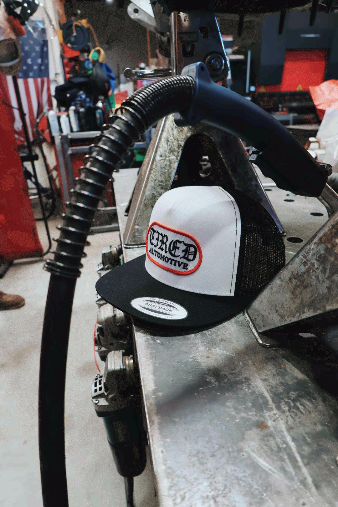 Tired Automotive Old English Logo Hat