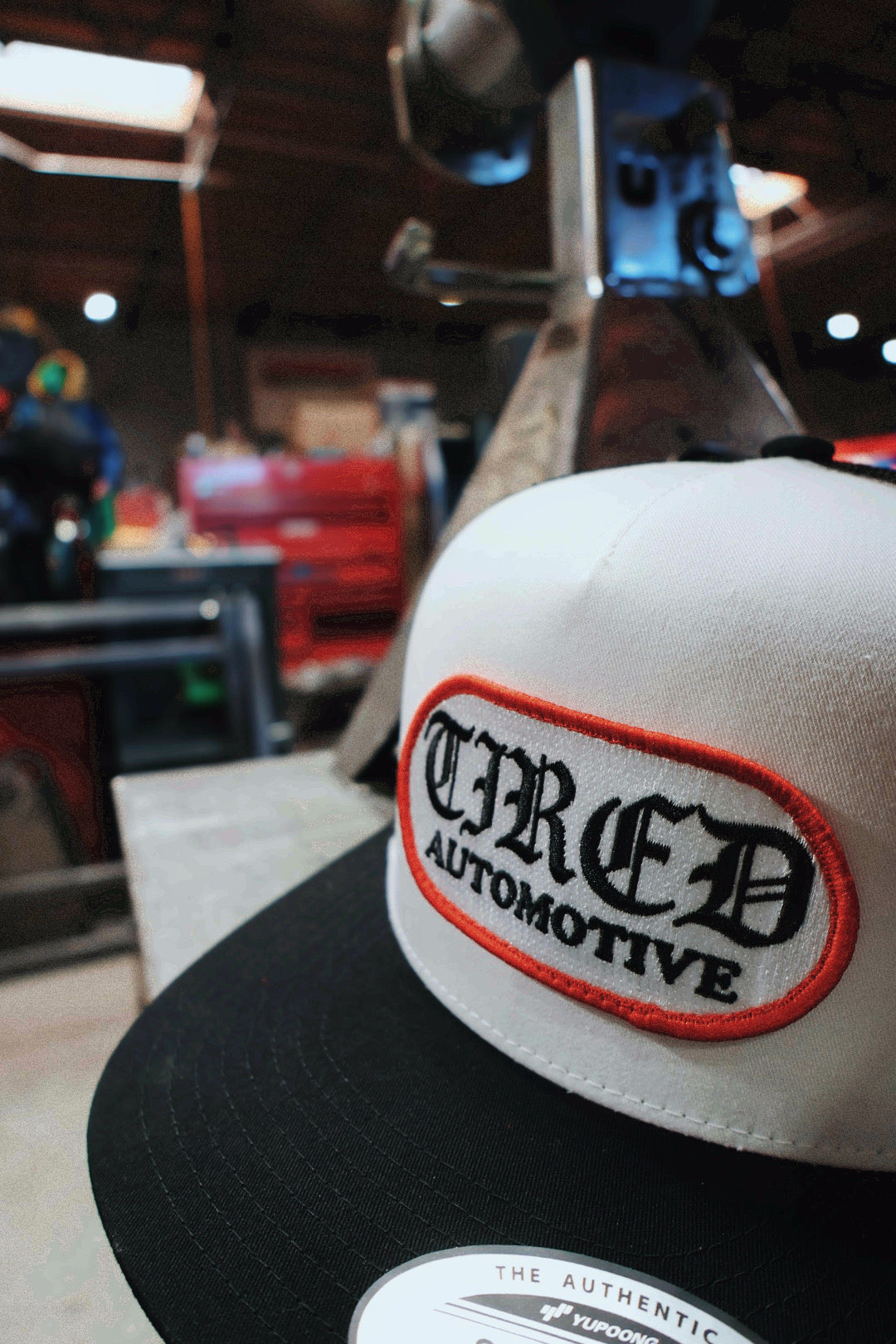 Tired Automotive Old English Logo Hat