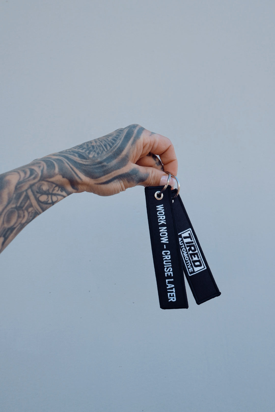 Tired Flight Tag Keychain