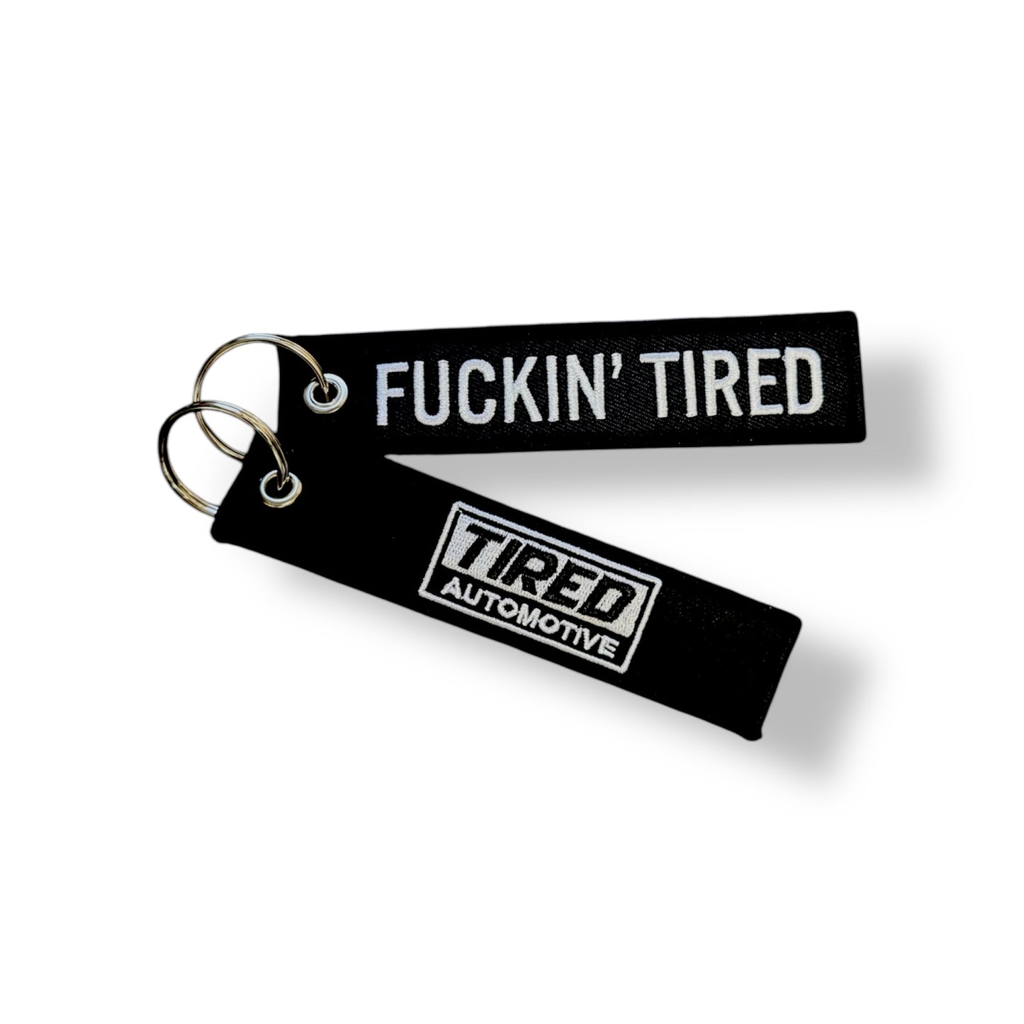 Tired Flight Tag Keychain