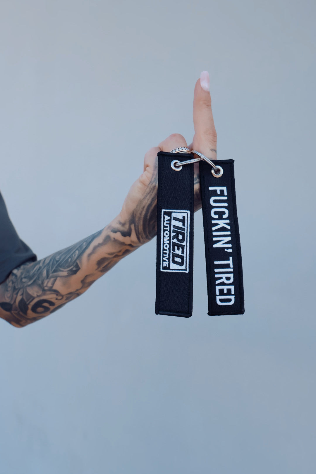 Tired Flight Tag Keychain