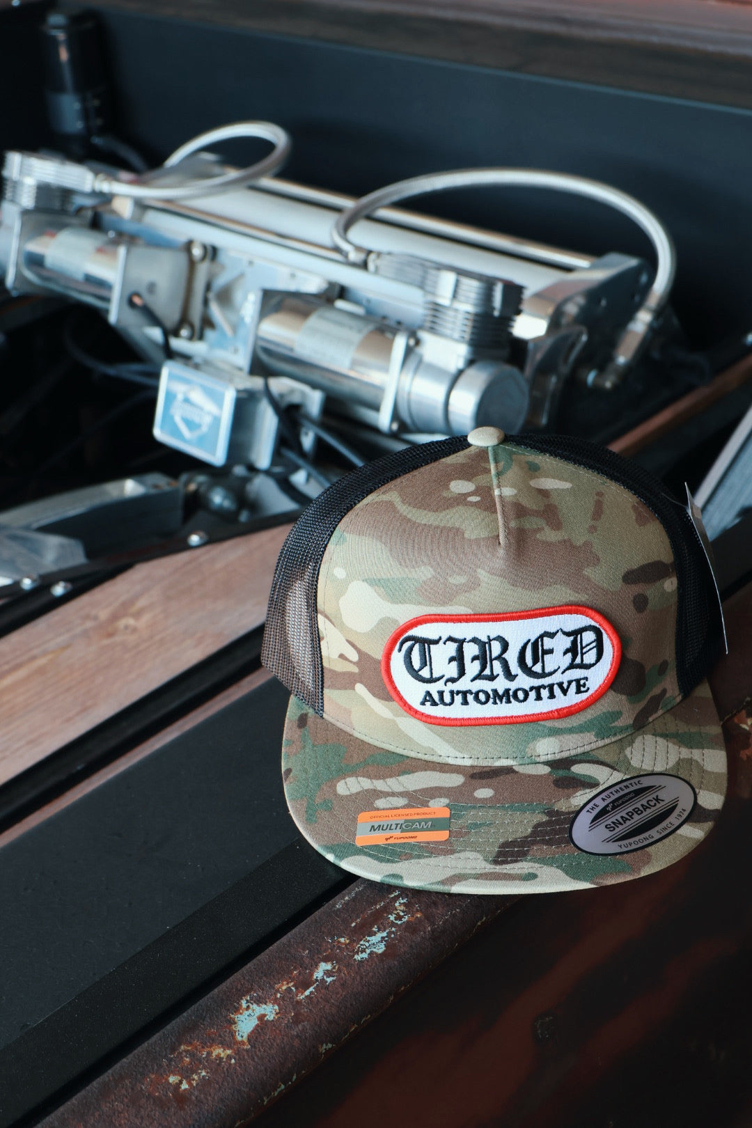 Tired Automotive Old English Logo Hat