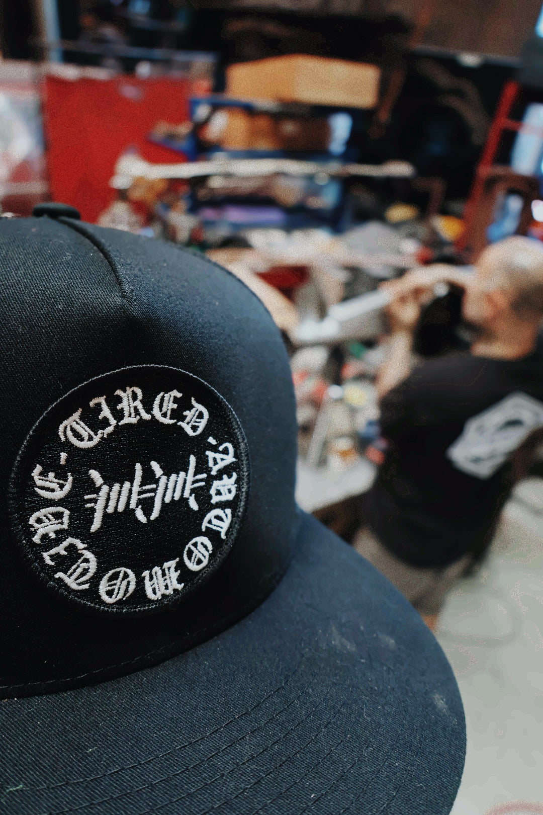 Tired Automotive Barbwire Logo Hat